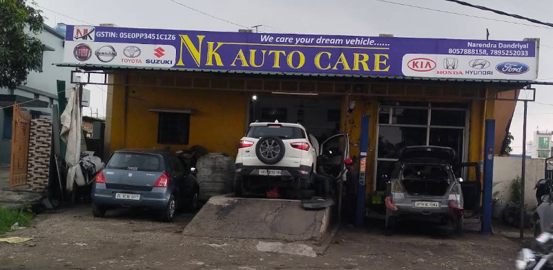 NK AUTO CARE logo